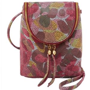 Women's Hobo fern abstract foliage printed leather cross body bag.